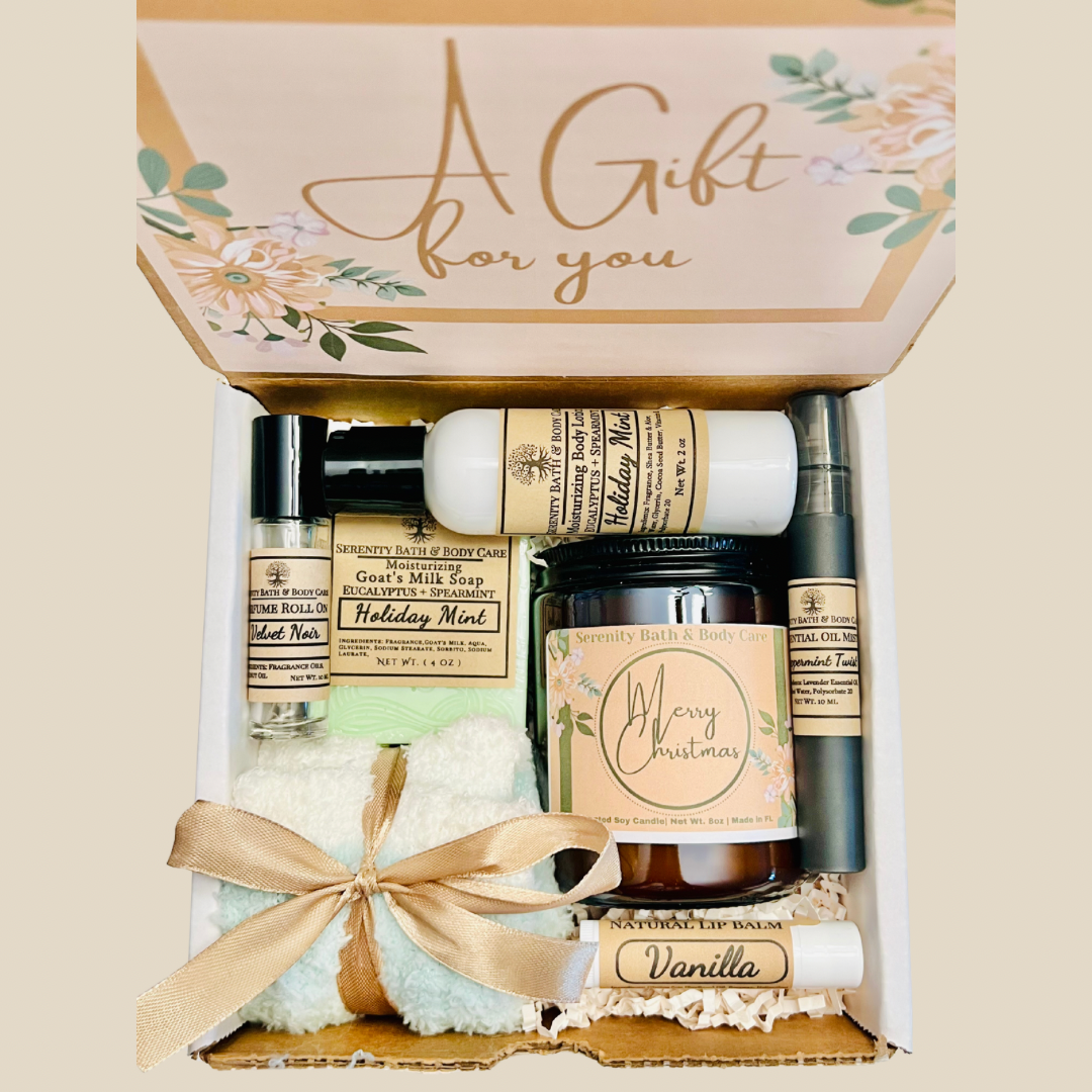 Holiday Mint Spa Gift Box with mint soap, lotion, candle, lip balm, perfume oil, cozy cloth, and Christmas packaging.
