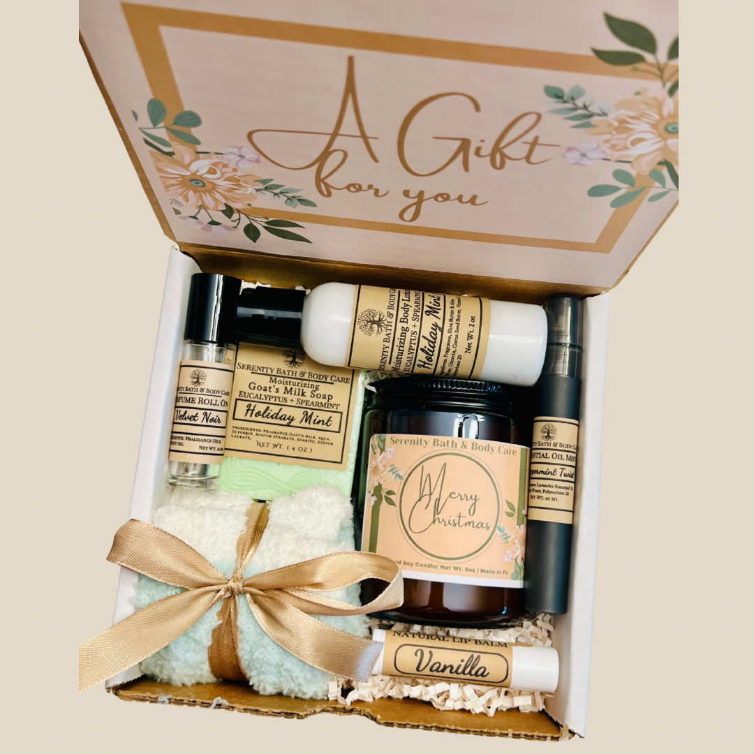 Holiday Mint Spa Gift Box with mint soap, lotion, candle, lip balm, perfume oil, cozy cloth, and Christmas packaging.