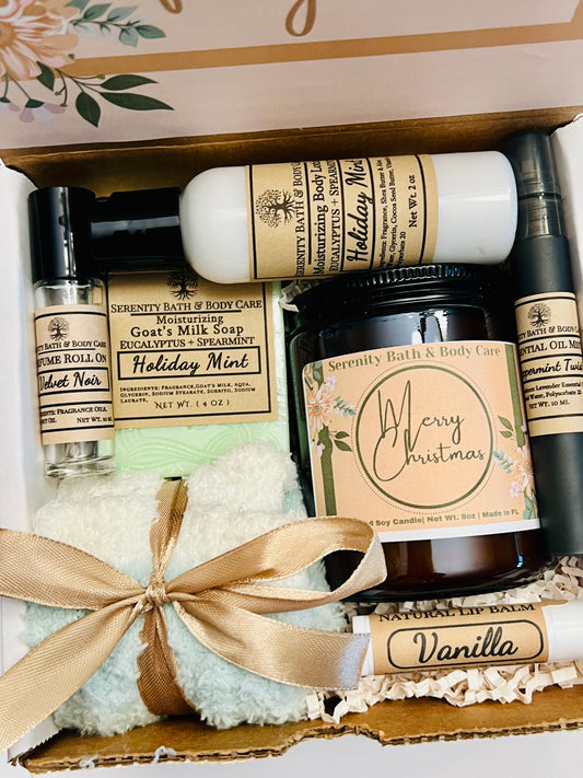 Holiday Mint Spa Gift Box with mint soap, lotion, candle, lip balm, perfume oil, cozy cloth, and Christmas packaging.