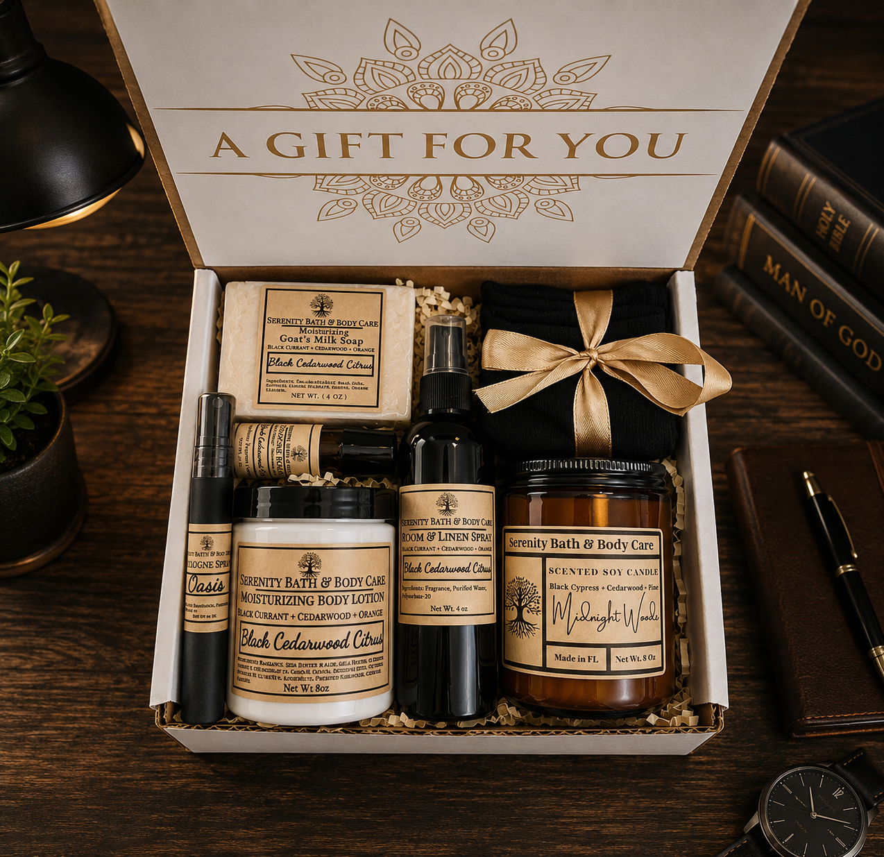 Men's luxury gift box open showing goat milk soap, body lotion, room spray, cologne, soy candle and socks
