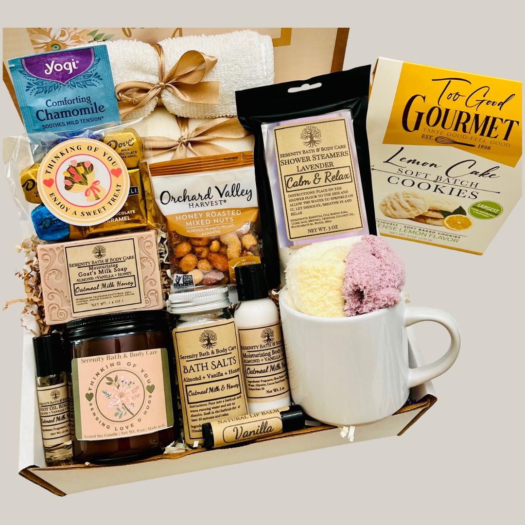 Luxury deluxe spa gift box for women with blanket, candle, tea, and self care items

Thinking of you spa gift basket with oatmeal milk honey bath products

Sympathy gift box for women with cozy blanket, mug, candle, and gourmet treats

Birthday self care gift box for women with spa essentials and comfort items

Pampering spa gift basket with fuzzy socks, shower steamers, and chamomile tea